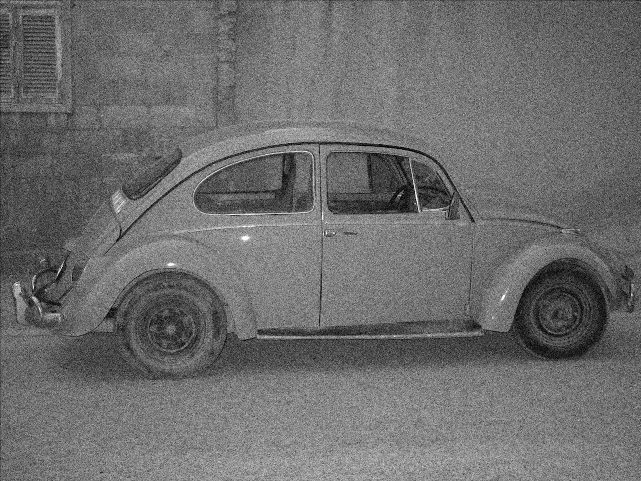 Vintage car with film grain